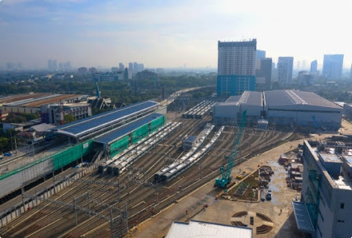 Commuter train at an urban station