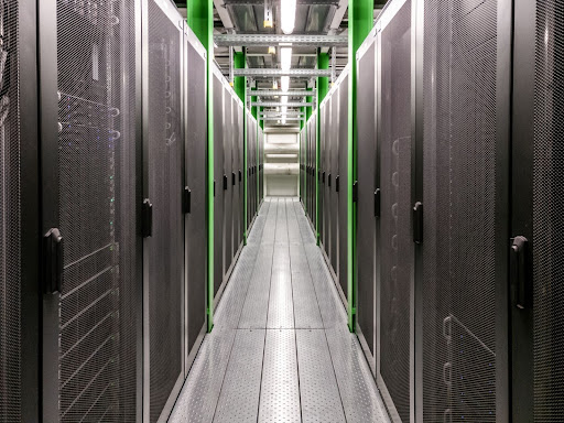 Interior aisle view of data centre server racks