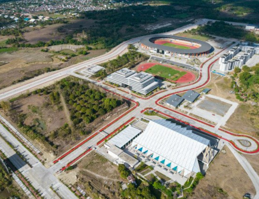 Aerial view of New Clark City with green spaces and modern infrastructure