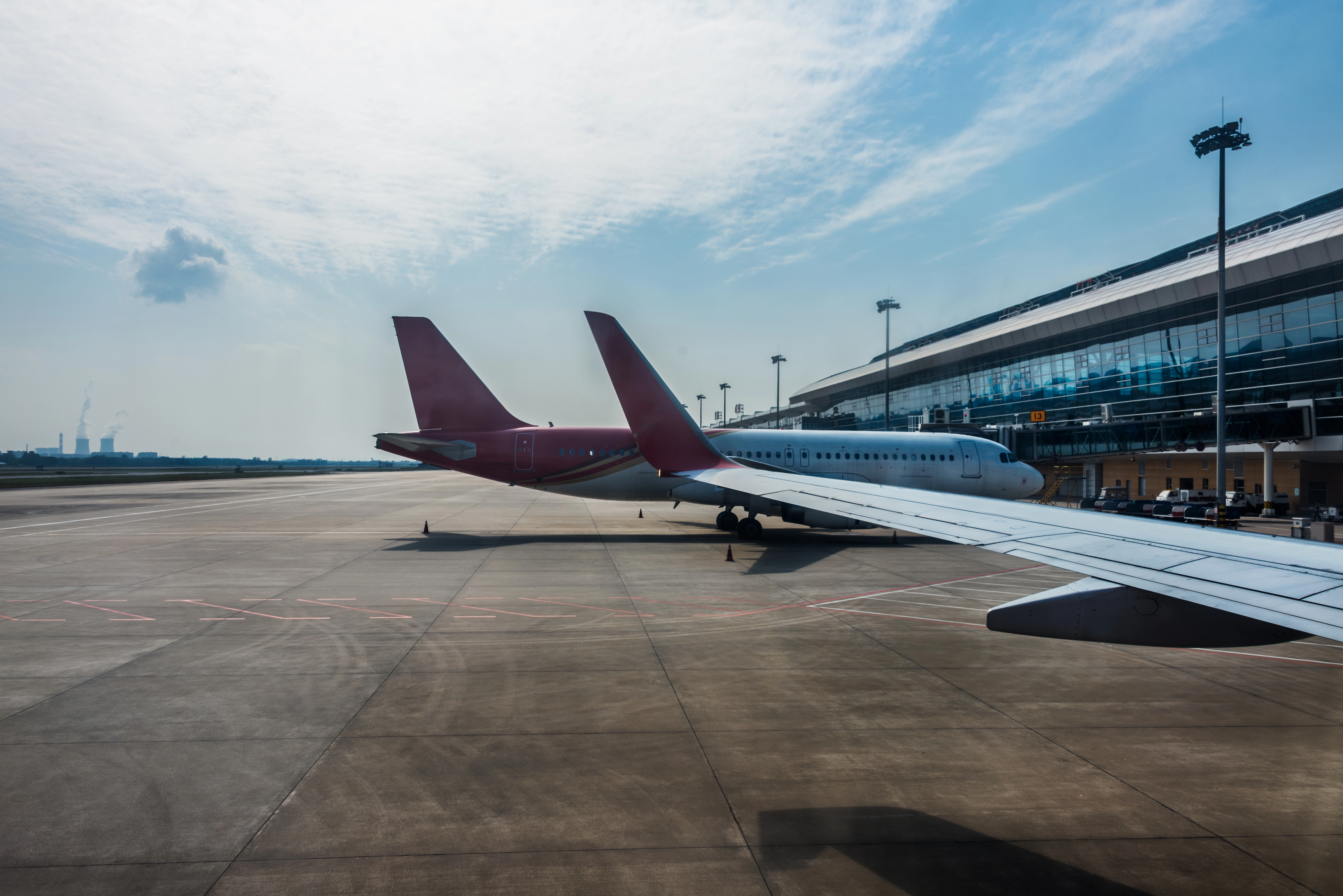 Planes on runway at modern airport